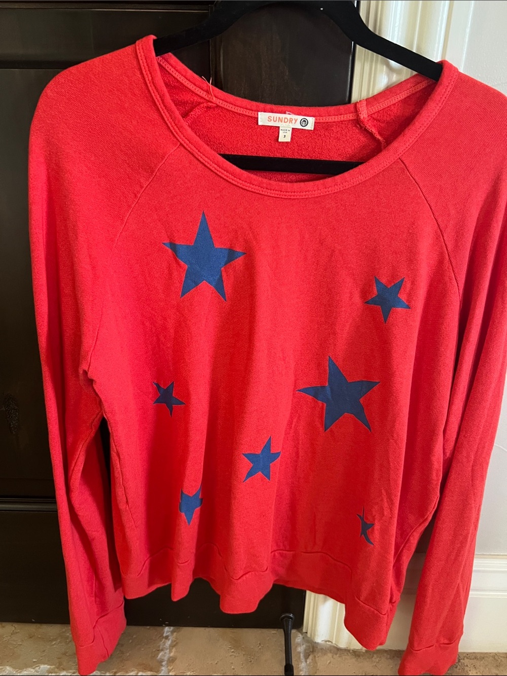 Sundry Red Sweatshirt with Navy Star Accents.. never worn